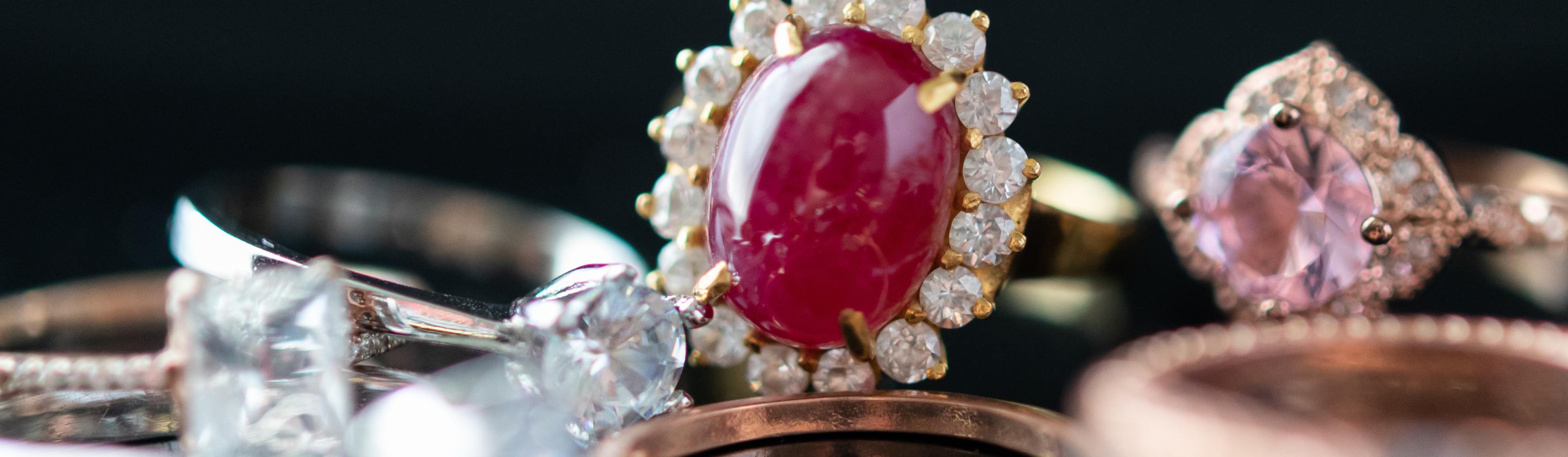 big red ruby ring with jewellery background