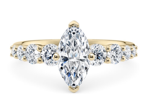 Lyra in Yellow Gold set with a Marquise cut diamond.