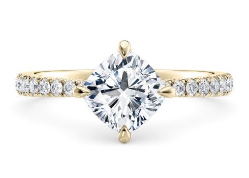 Asteria in Yellow Gold set with a Cushion cut diamond.
